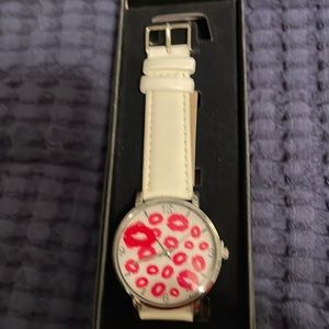 NWOT white band “Kisses” watch.